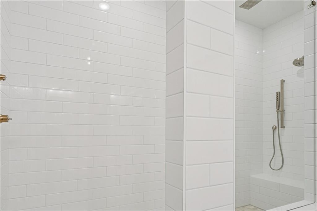 1502 Westend Way, Unit 331 Cumming, GA 30041 - Photo 16 of 38 a bathroom with a shower