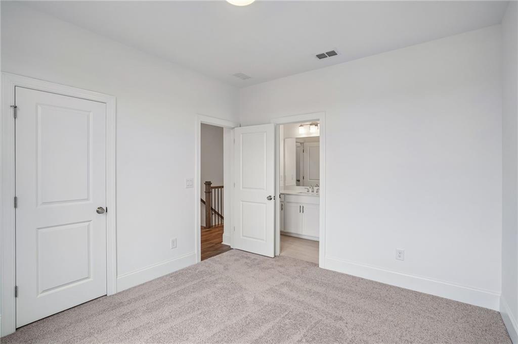 1502 Westend Way, Unit 331 Cumming, GA 30041 - Photo 22 of 38 a view of an empty room