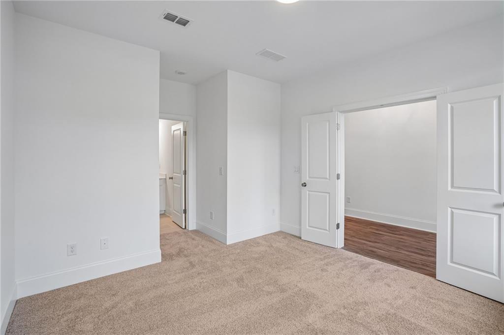 1502 Westend Way, Unit 331 Cumming, GA 30041 - Photo 3 of 38 a view of an empty room