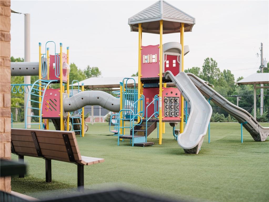 1502 Westend Way, Unit 331 Cumming, GA 30041 - Photo 36 of 38 a childrens park with lots of swings and slides