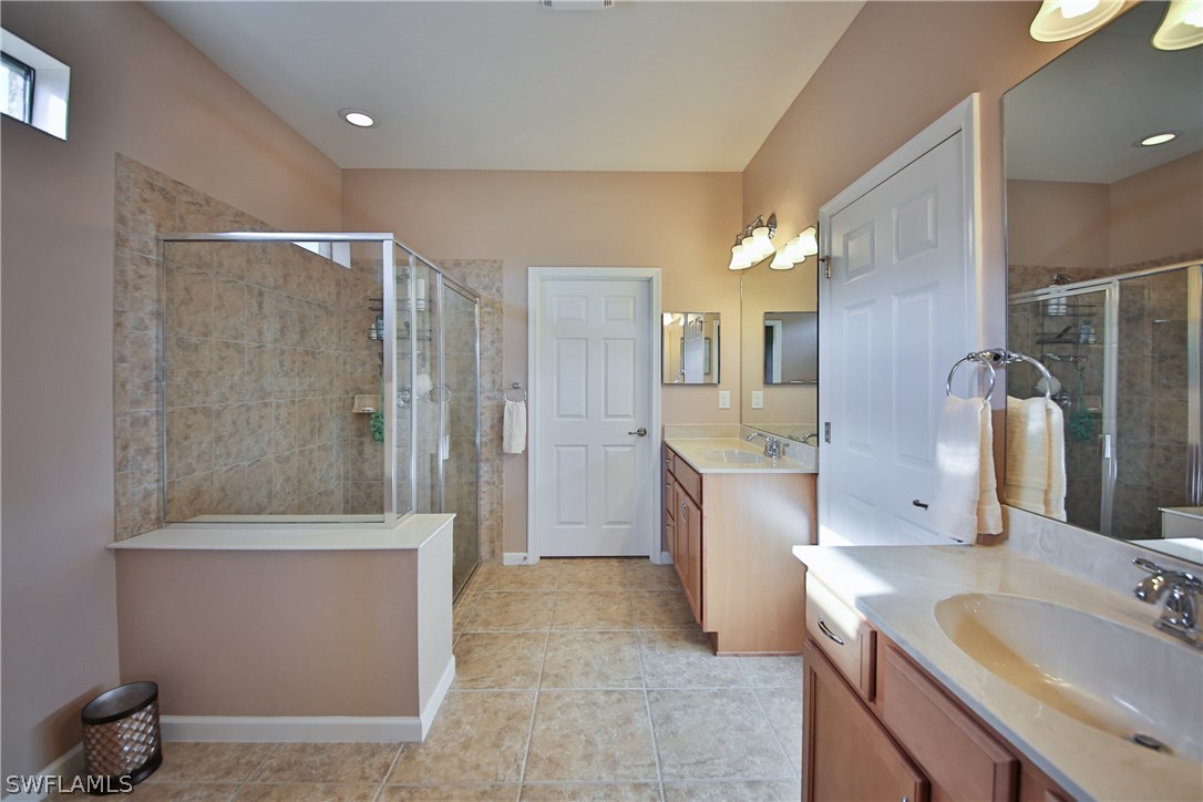 10805 Rutherford Road Fort Myers, FL 33913 - Photo 9 of 25 a bathroom with a sink a toilet and shower