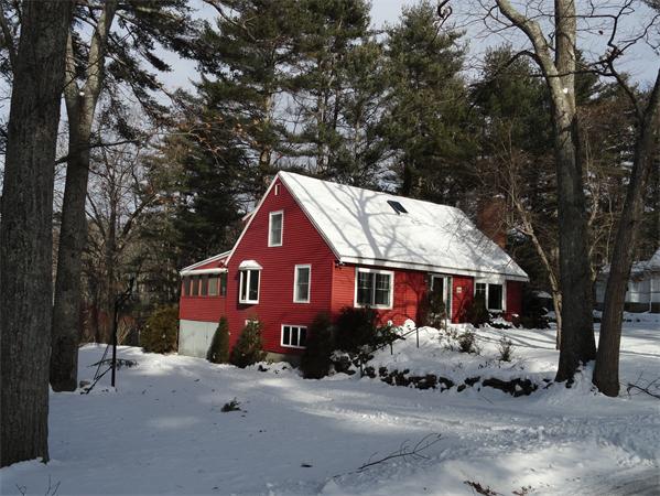 23 Hiley Brook Road Stow, MA 01775 - Photo 1 of 6 a front view of a house with a yard