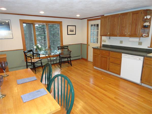 23 Hiley Brook Road Stow, MA 01775 - Photo 2 of 6 a very nice looking dining room with a large window and dining table