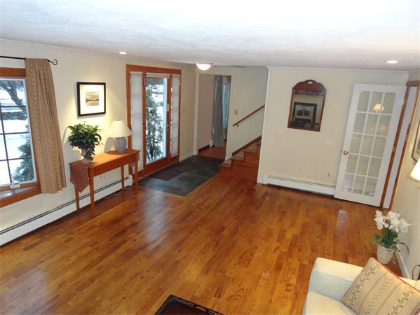 23 Hiley Brook Road Stow, MA 01775 - Photo 3 of 6 a view of livingroom with hardwood floor and furniture