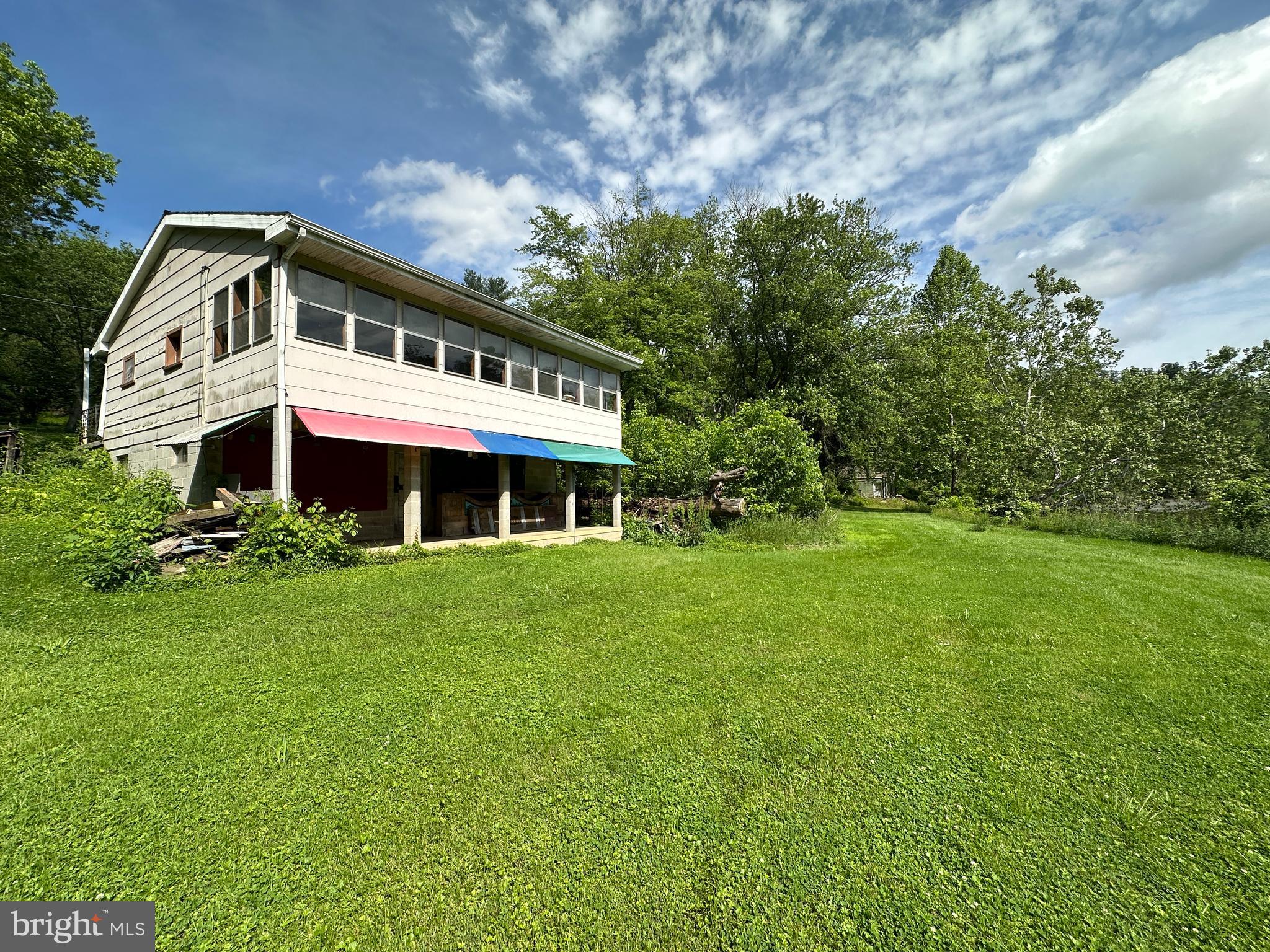 13726 Hopps Landing Road Hagerstown, MD 21740 - Photo 39 of 71 a front view of house with yard and green space