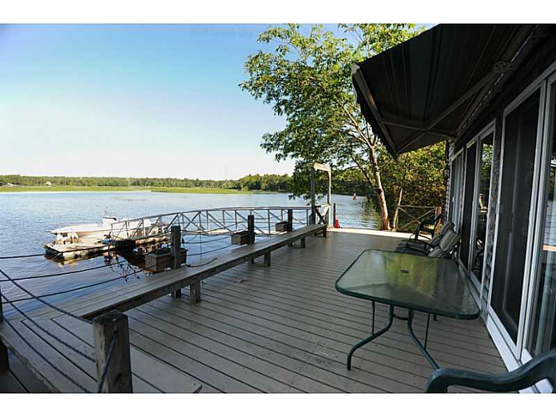 29 Stevens Road Bowdoinham, ME 04008 - Photo 32 of 35 Patio/Deck. Deck wraps around to...