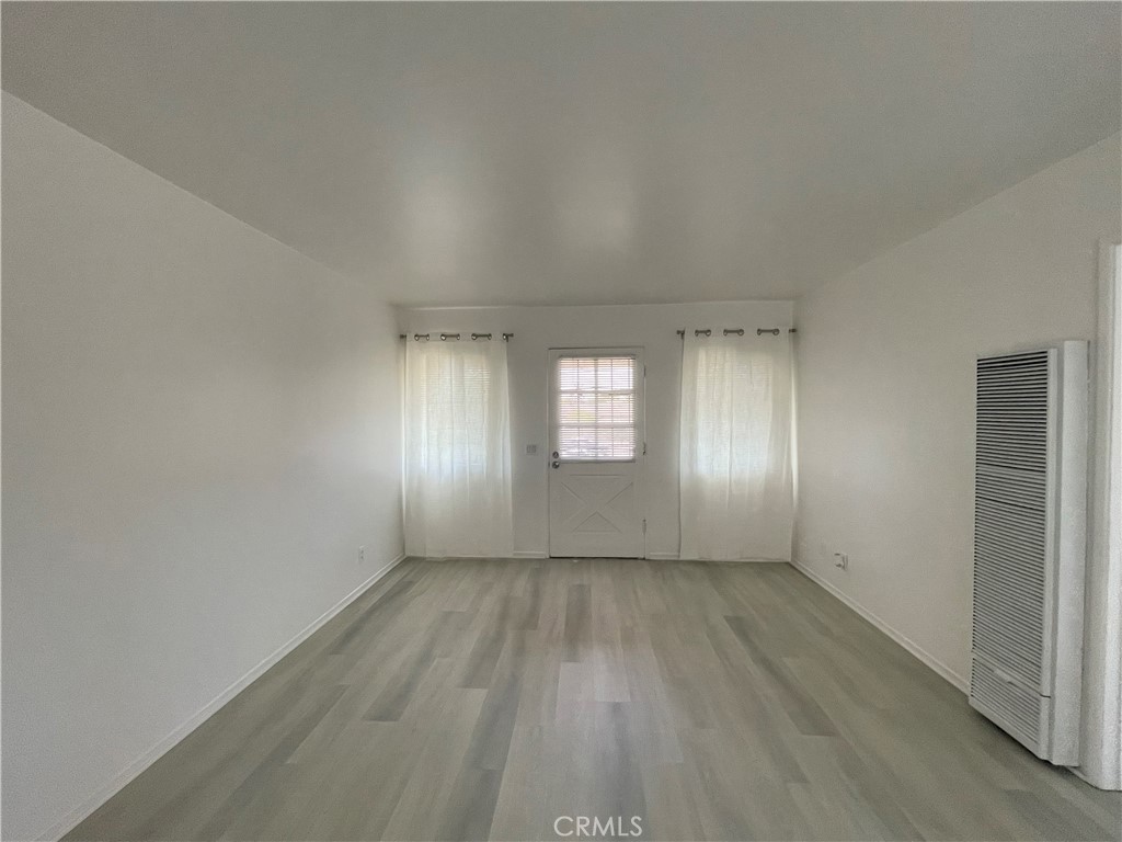 1781 West Ball Road, Unit 4 Anaheim, CA 92804 - Photo 7 of 15 Main Entrance to Living Room and Dining Area