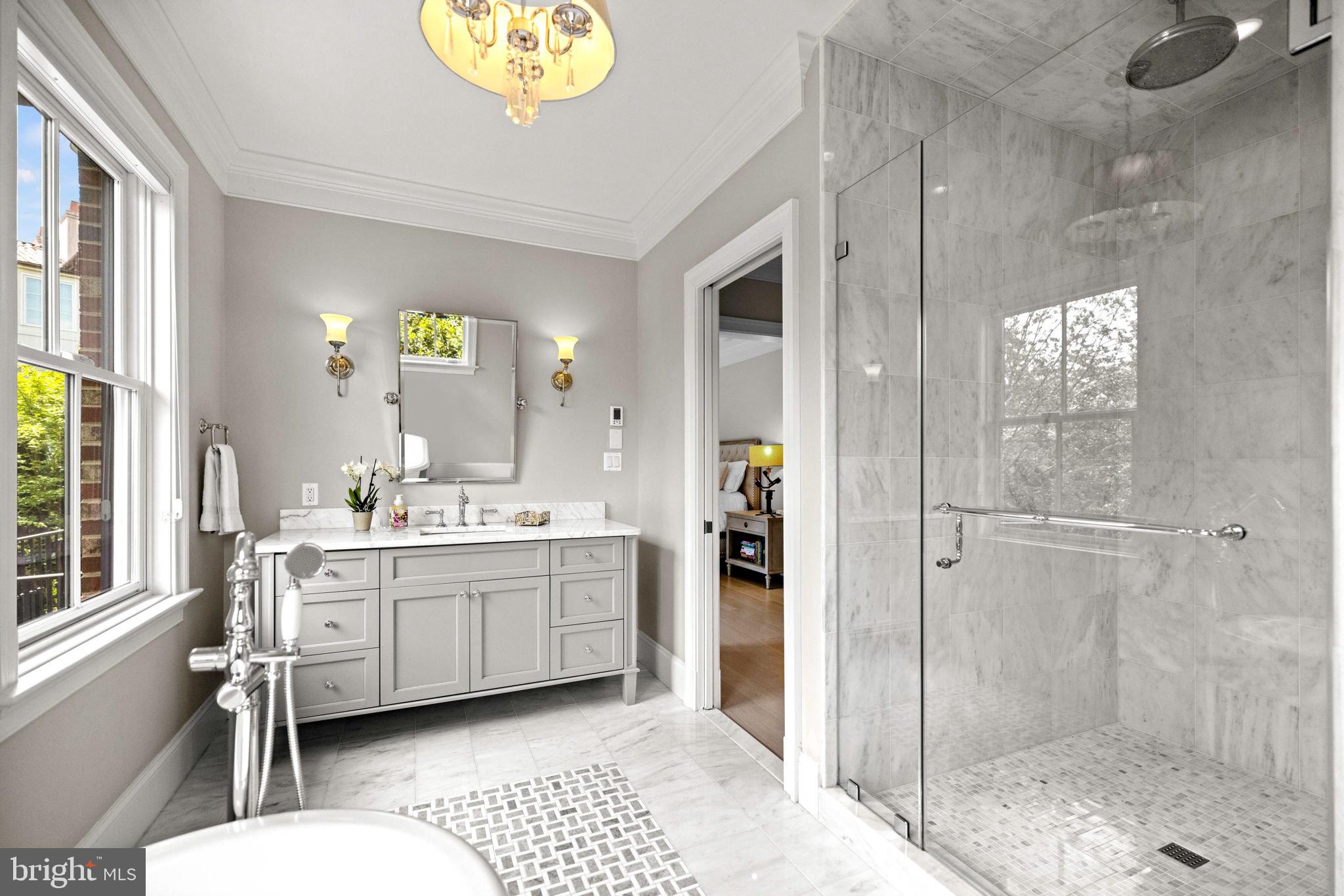 4410 Meadow Road Washington, DC 20007 - Photo 17 of 30 a bathroom with a sink a toilet and shower