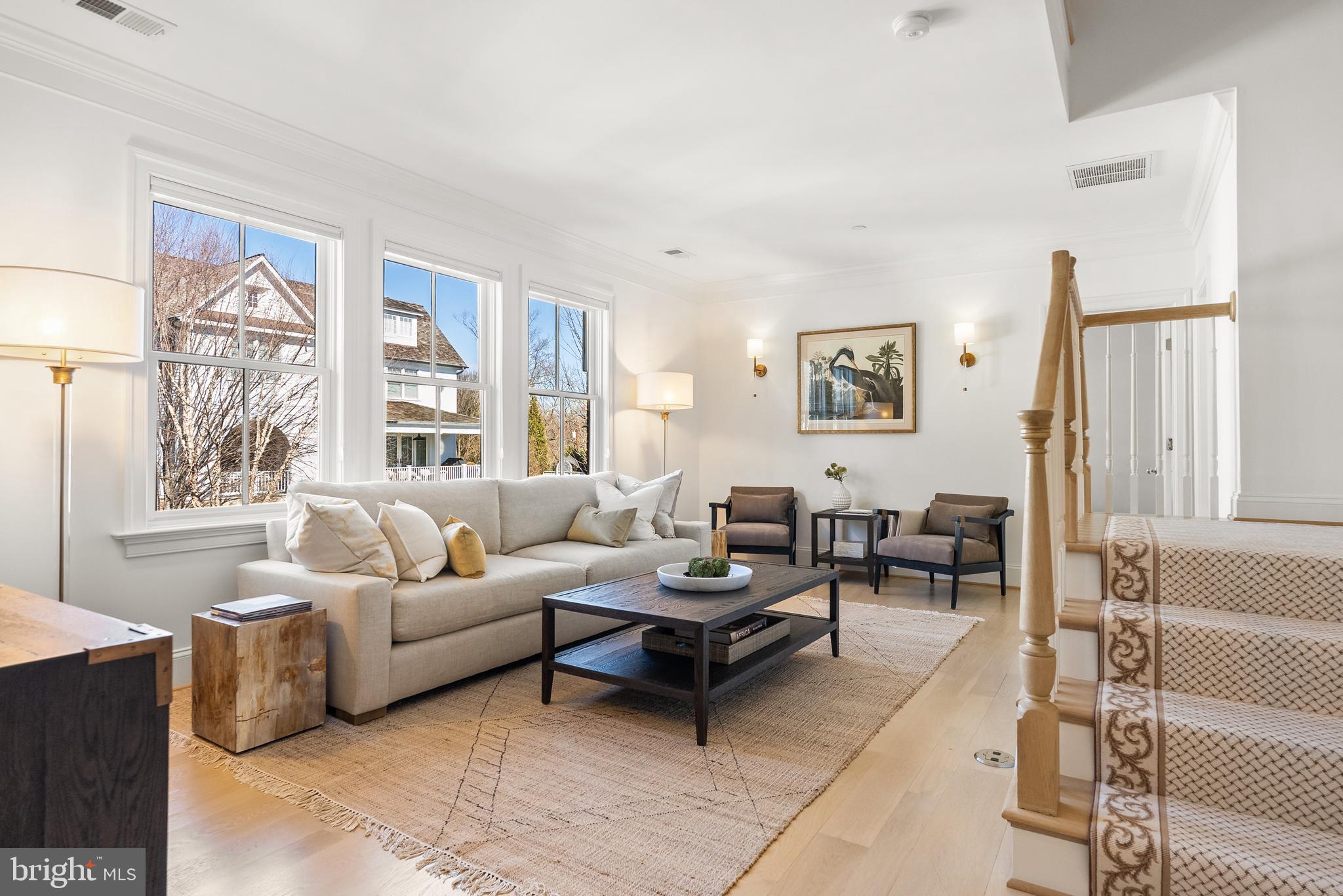 4410 Meadow Road Washington, DC 20007 - Photo 19 of 30 a living room with furniture a rug and a large window