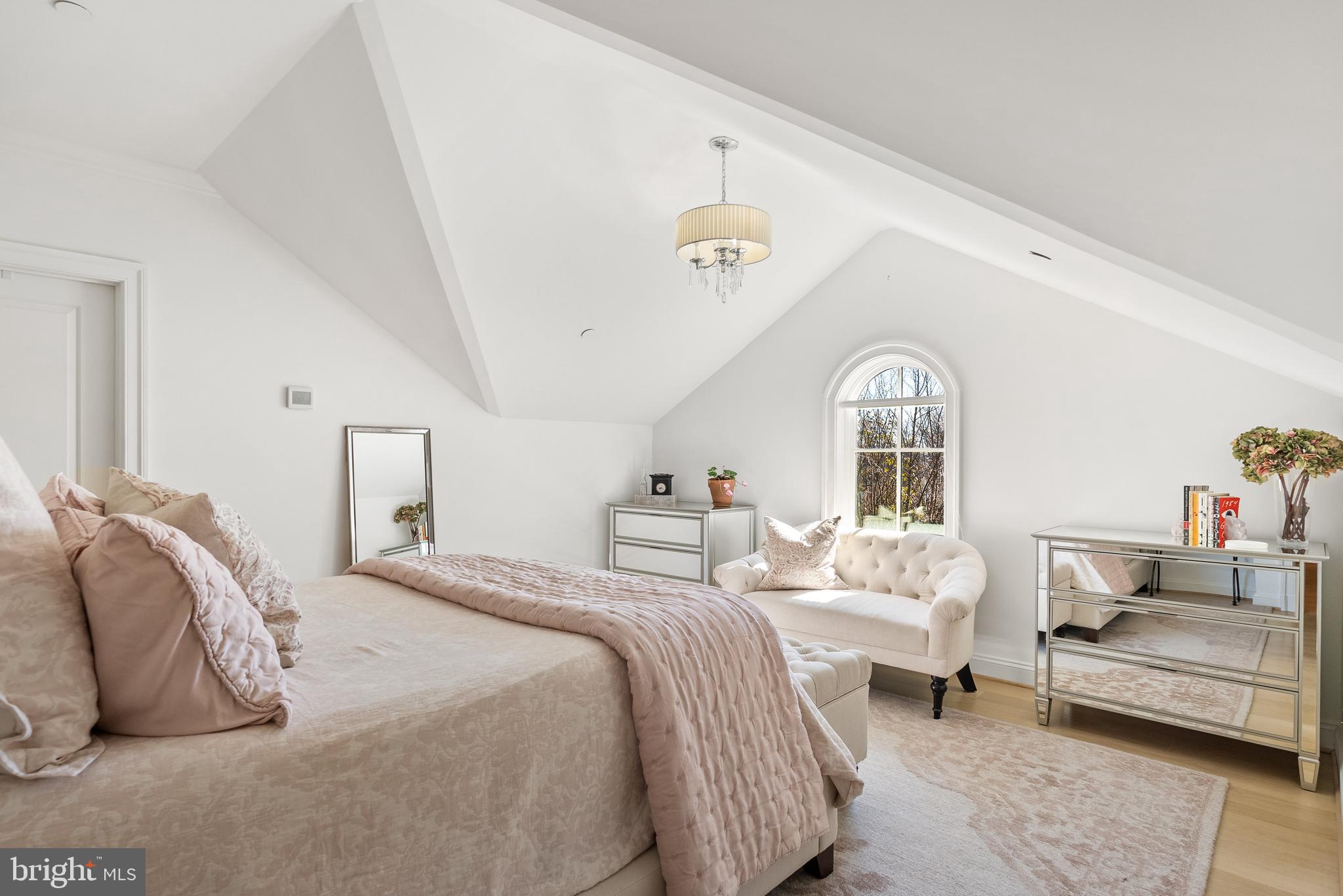 4410 Meadow Road Washington, DC 20007 - Photo 23 of 30 a bedroom with a bed and a couch