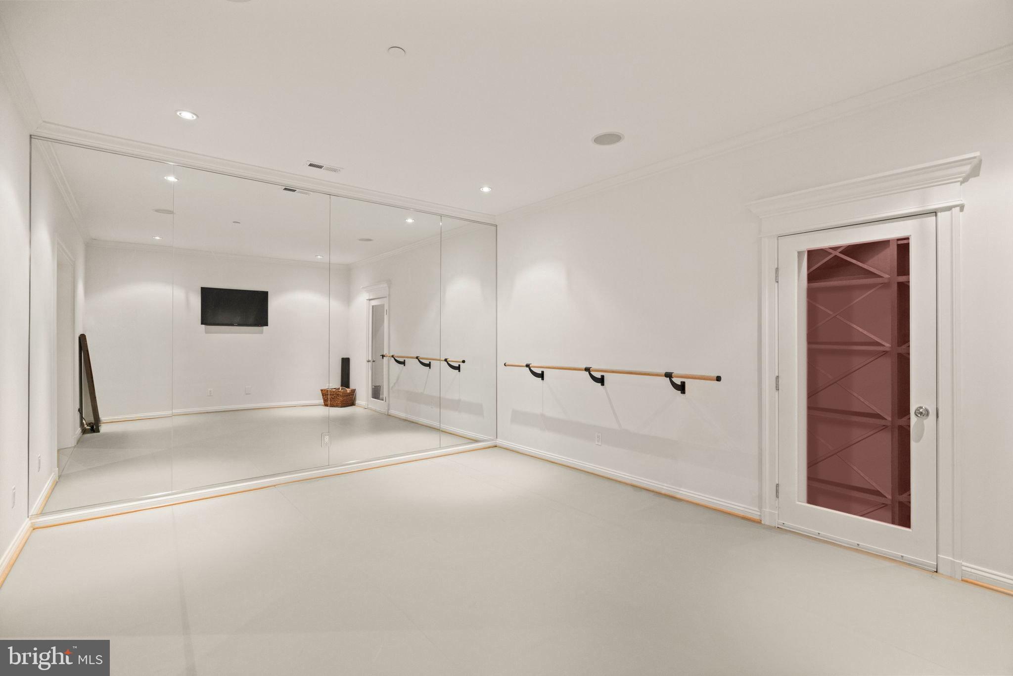 4410 Meadow Road Washington, DC 20007 - Photo 26 of 30 an empty room with a empty space and windows