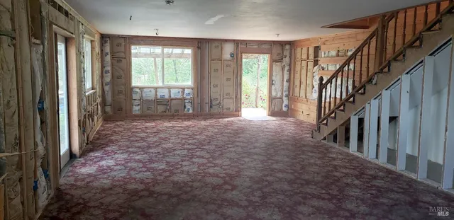 a view of entryway with livingroom