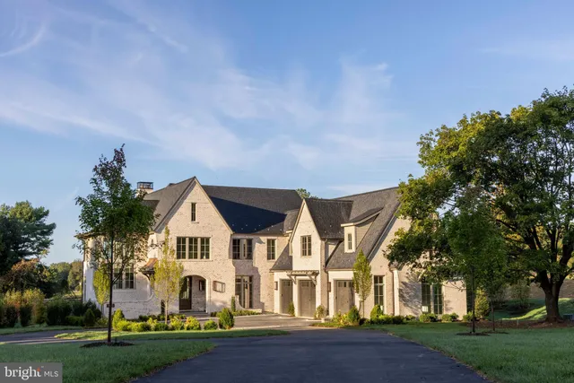 a view of house with yard and entertaining space