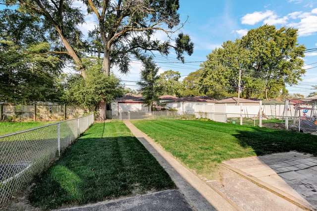 a view of a garden with a bench
