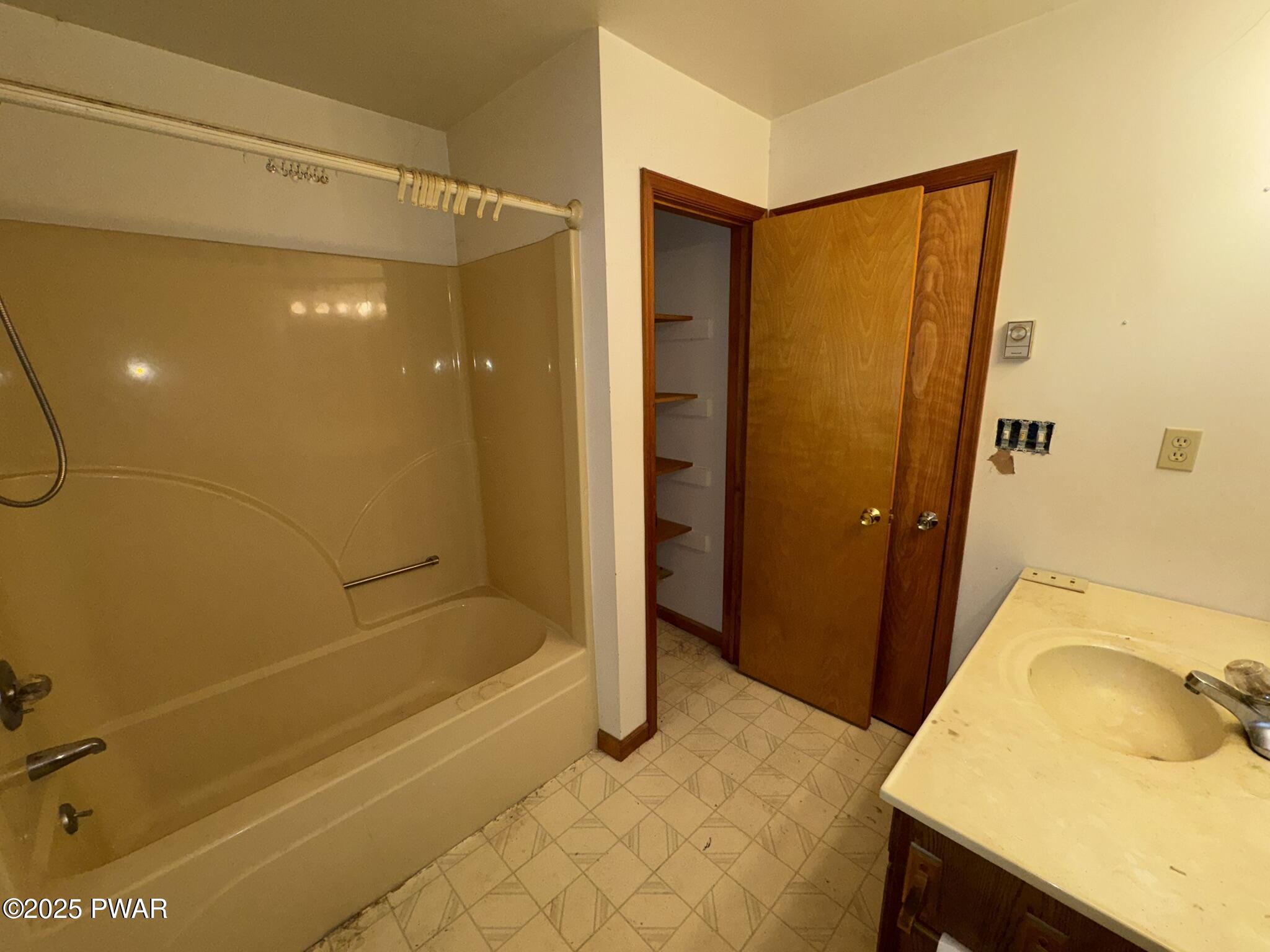 21 Tuthill Road Waymart, PA 18472 - Photo 9 of 49 a bathroom with a bathtub and a shower
