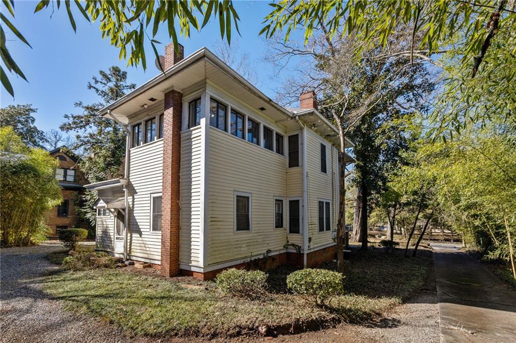 120 South Candler Street Decatur, GA 30030 - Photo 2 of 40 a view of a house with a yard
