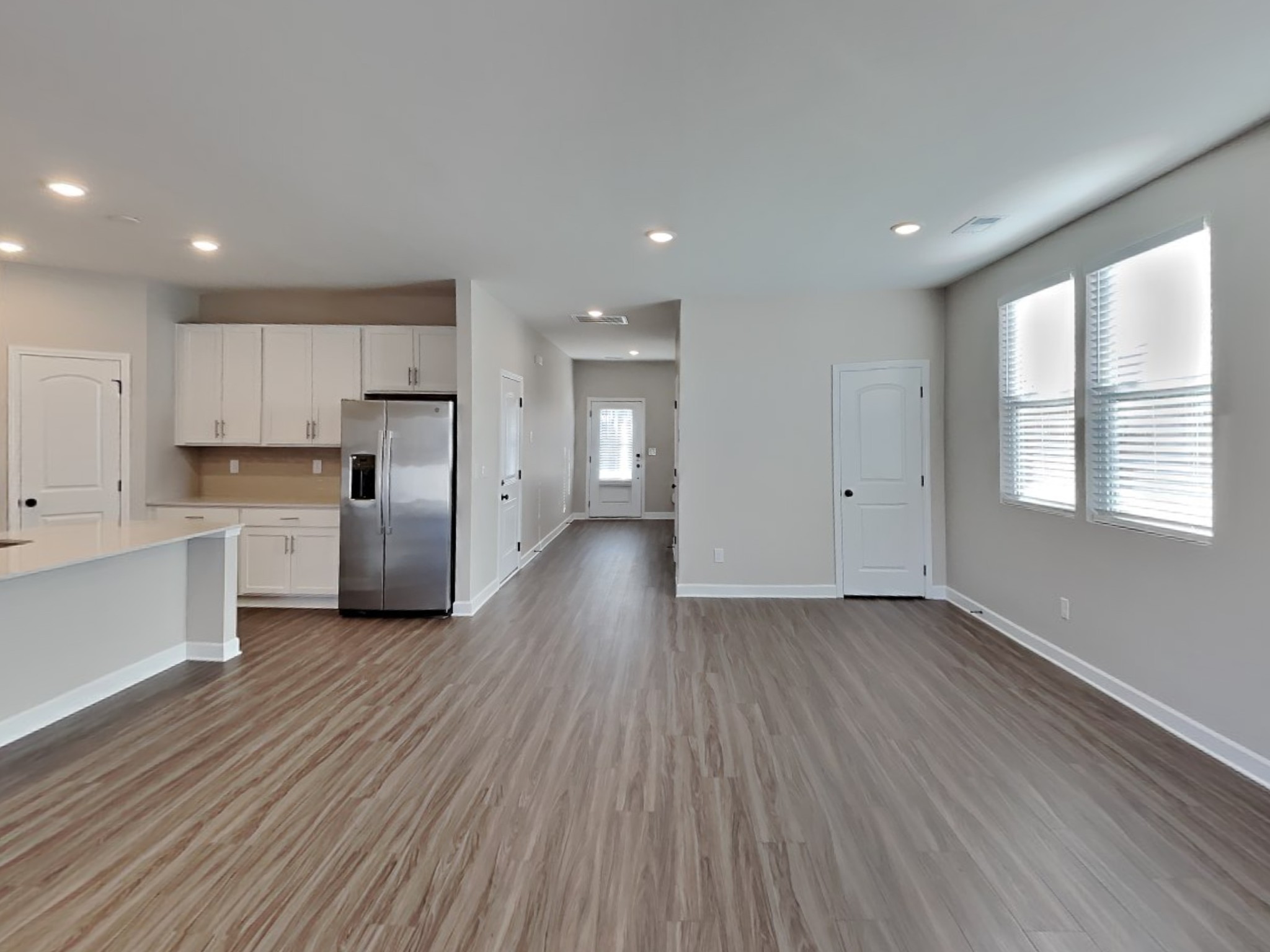 819 Averitt Lane Lebanon, TN 37087 - Photo 3 of 18 a view of kitchen with wooden floor electronic appliances and window