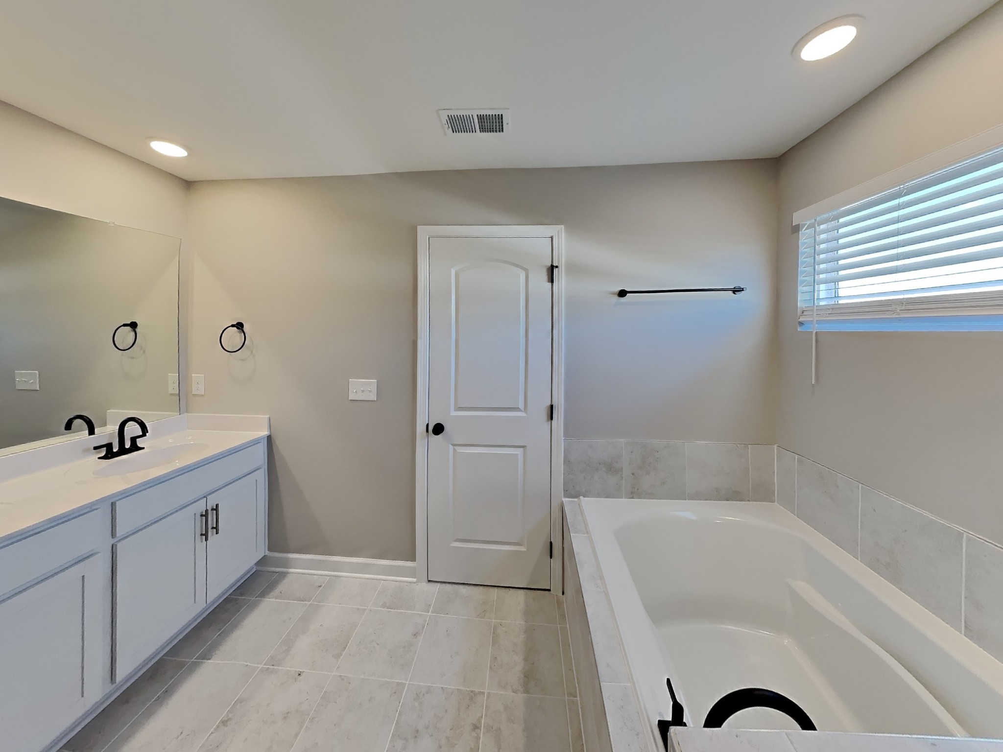 819 Averitt Lane Lebanon, TN 37087 - Photo 10 of 18 a bathroom with a bathtub and a sink