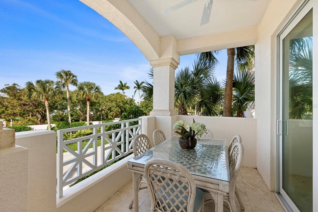 729 South Harbor Drive, Unit 1 Boca Grande, FL 33921 - Photo 21 of 68 a view of a chairs and table in patio