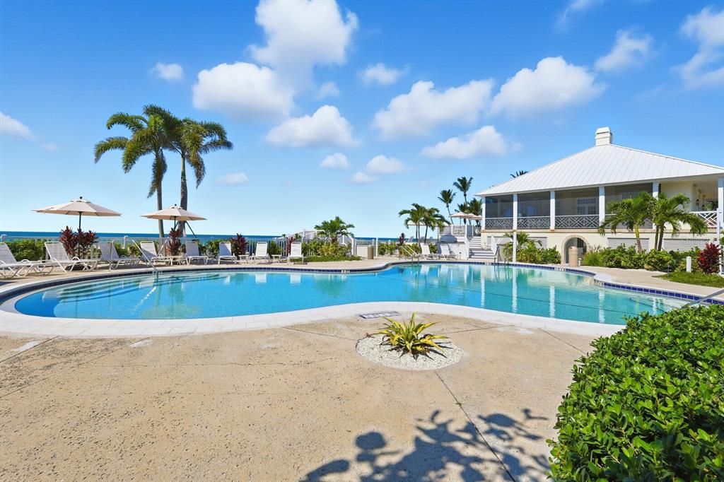 729 South Harbor Drive, Unit 1 Boca Grande, FL 33921 - Photo 25 of 68 a view of a swimming pool with a patio
