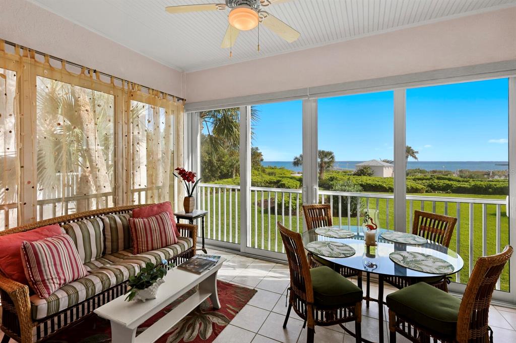 729 South Harbor Drive, Unit 1 Boca Grande, FL 33921 - Photo 6 of 68 a view of a dining room with furniture window and outside view