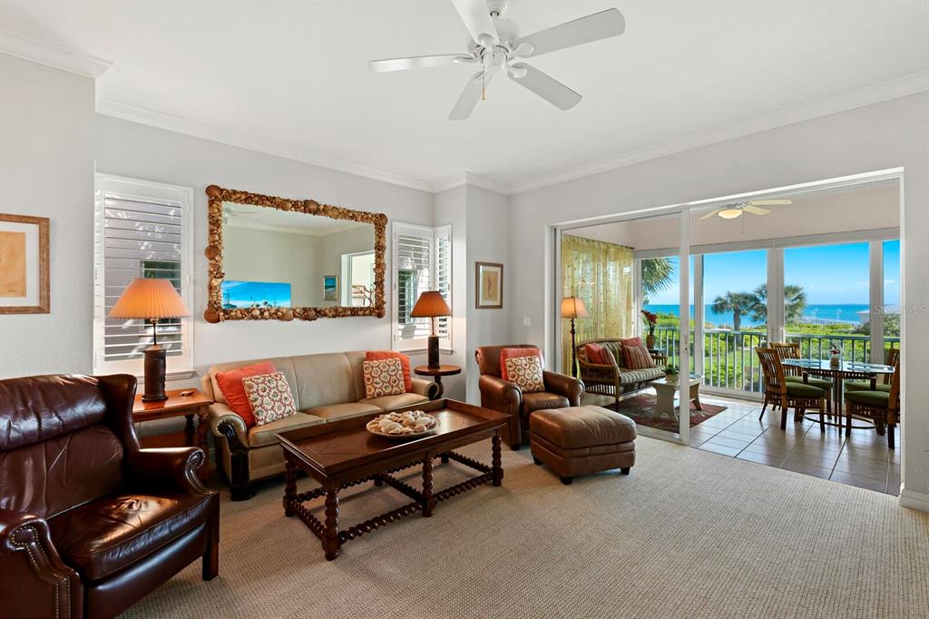729 South Harbor Drive, Unit 1 Boca Grande, FL 33921 - Photo 7 of 68 a living room with furniture and a large window