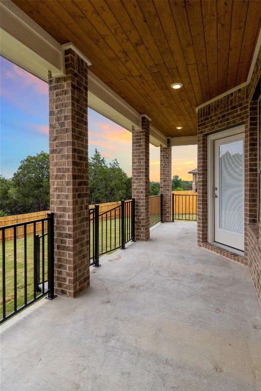 5809 Ariel Cove Belton, TX 76513 - Photo 14 of 15 a view of porch with a floor to ceiling window and wooden fence