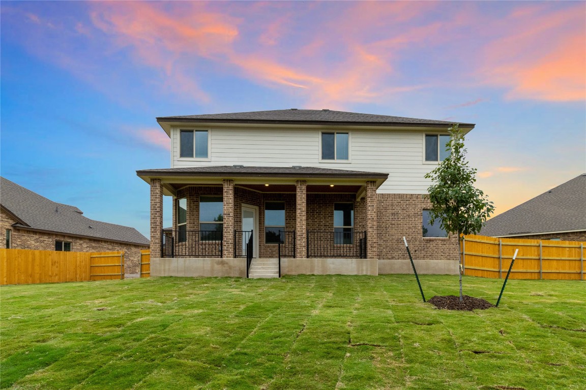 5809 Ariel Cove Belton, TX 76513 - Photo 15 of 15 a backyard of a house with table and chairs