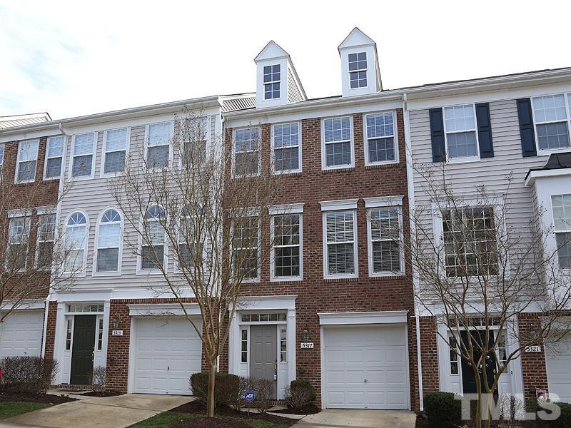 5317 Echo Ridge Road Raleigh, NC 27612 - Photo 1 of 17 a front view of a building with glass windows