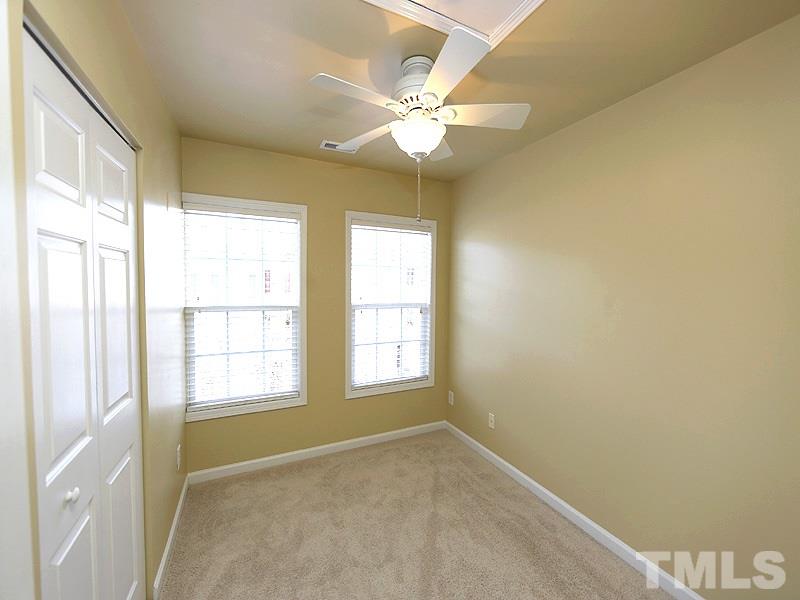 5317 Echo Ridge Road Raleigh, NC 27612 - Photo 13 of 17 a view of an empty room with a window