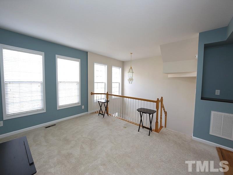 5317 Echo Ridge Road Raleigh, NC 27612 - Photo 3 of 17 a view of an empty room with a window