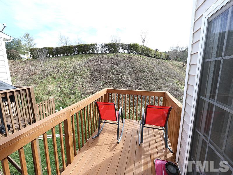 5317 Echo Ridge Road Raleigh, NC 27612 - Photo 9 of 17 a balcony with an outdoor view
