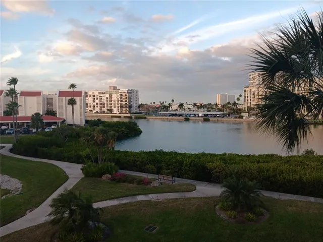 a view of a lake with a yard
