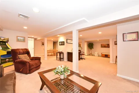 a living room with furniture and a table
