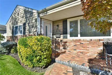 a view of a house with a patio