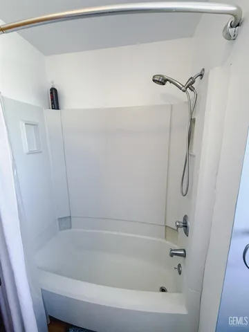a close view of a bathtub in bathroom