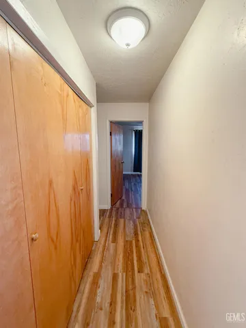 a view of a bathroom with a sink and a mirror