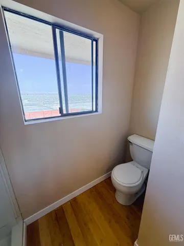 a bathroom with a toilet and a sink