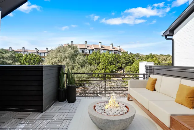 a view of a terrace with furniture
