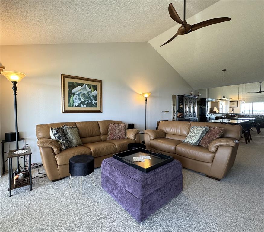 1155 Edgewater Circle, Unit 28 Bradenton, FL 34209 - Photo 12 of 50 a living room with furniture