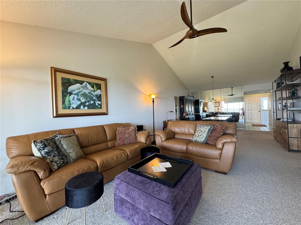 1155 Edgewater Circle, Unit 28 Bradenton, FL 34209 - Photo 14 of 50 a living room with furniture and a couch