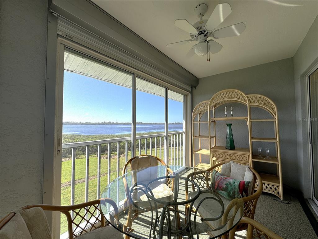 1155 Edgewater Circle, Unit 28 Bradenton, FL 34209 - Photo 20 of 50 a view of a dining room with furniture window and outside view