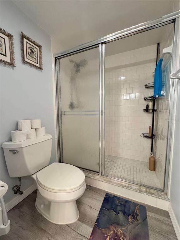 1155 Edgewater Circle, Unit 28 Bradenton, FL 34209 - Photo 26 of 50 a bathroom with a toilet and a shower