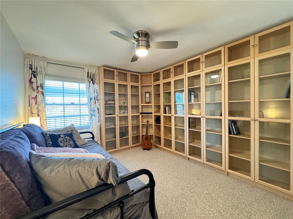 1155 Edgewater Circle, Unit 28 Bradenton, FL 34209 - Photo 30 of 50 a spacious bedroom with a bed and a window