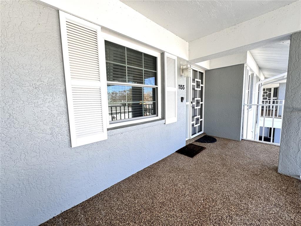 1155 Edgewater Circle, Unit 28 Bradenton, FL 34209 - Photo 3 of 50 a view of an empty room with a window