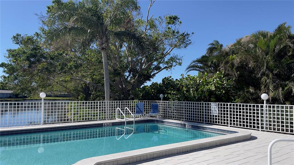 1155 Edgewater Circle, Unit 28 Bradenton, FL 34209 - Photo 37 of 50 a view of a tennis court