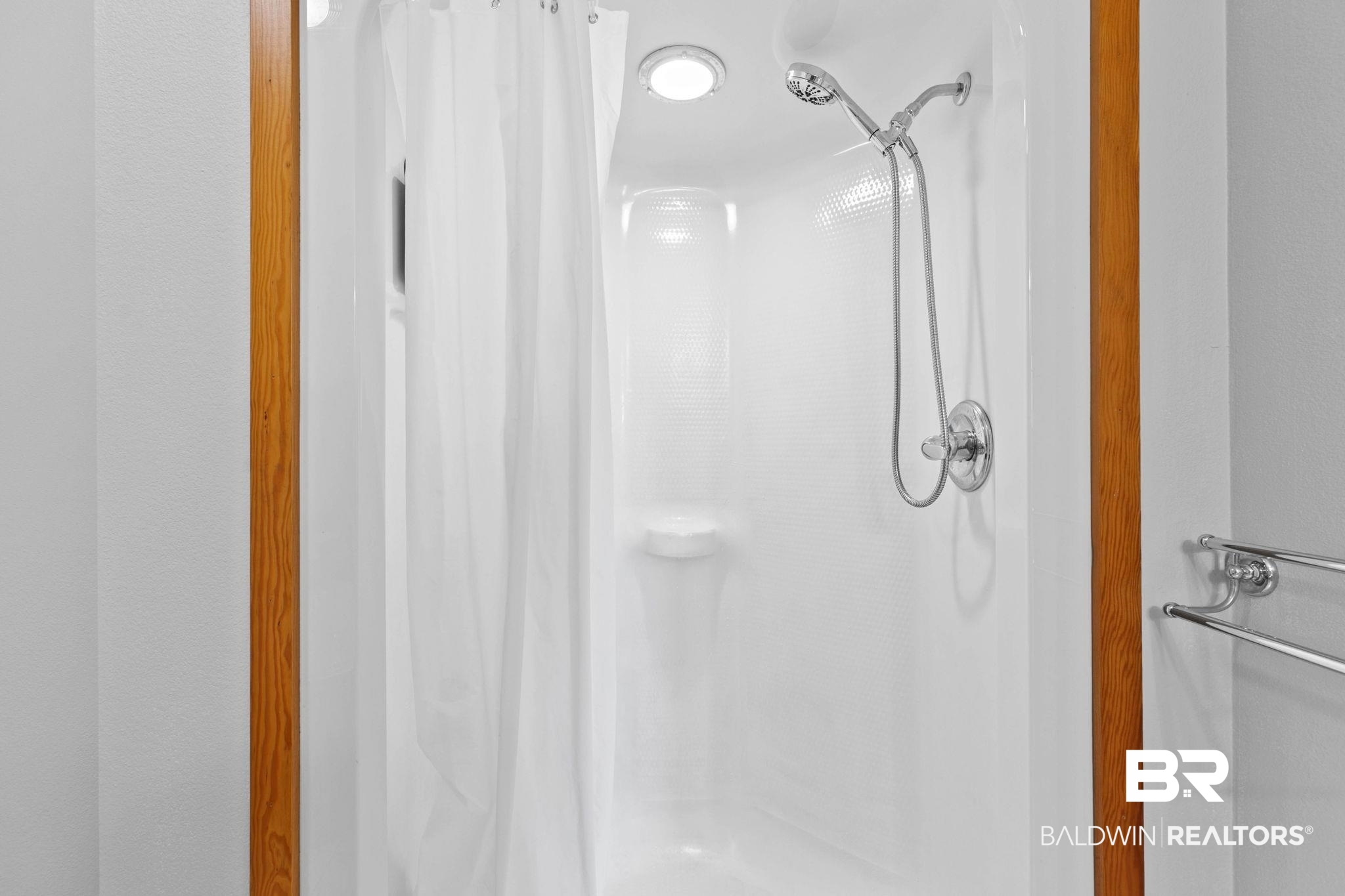 20219 Greek Cemetery Road Robertsdale, AL 36567 - Photo 26 of 41 Shower with white surround, recessed lighting, and a handheld shower head