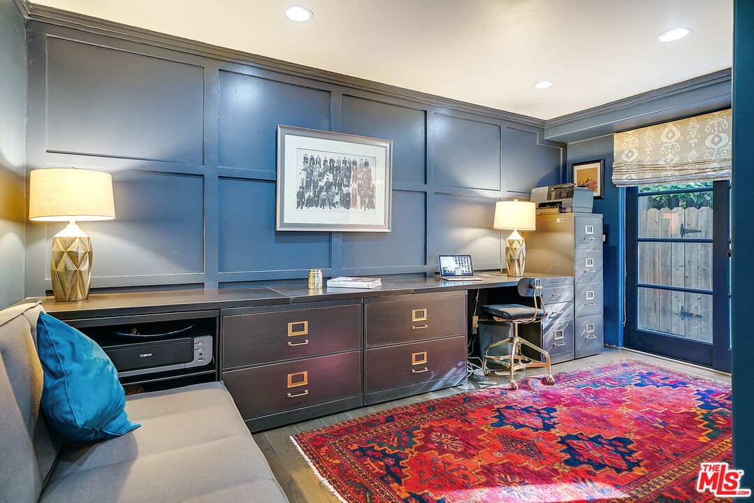 11670 Duque Drive Studio City, CA 91604 - Photo 14 of 48 a spacious bedroom with a bed and a dresser in it