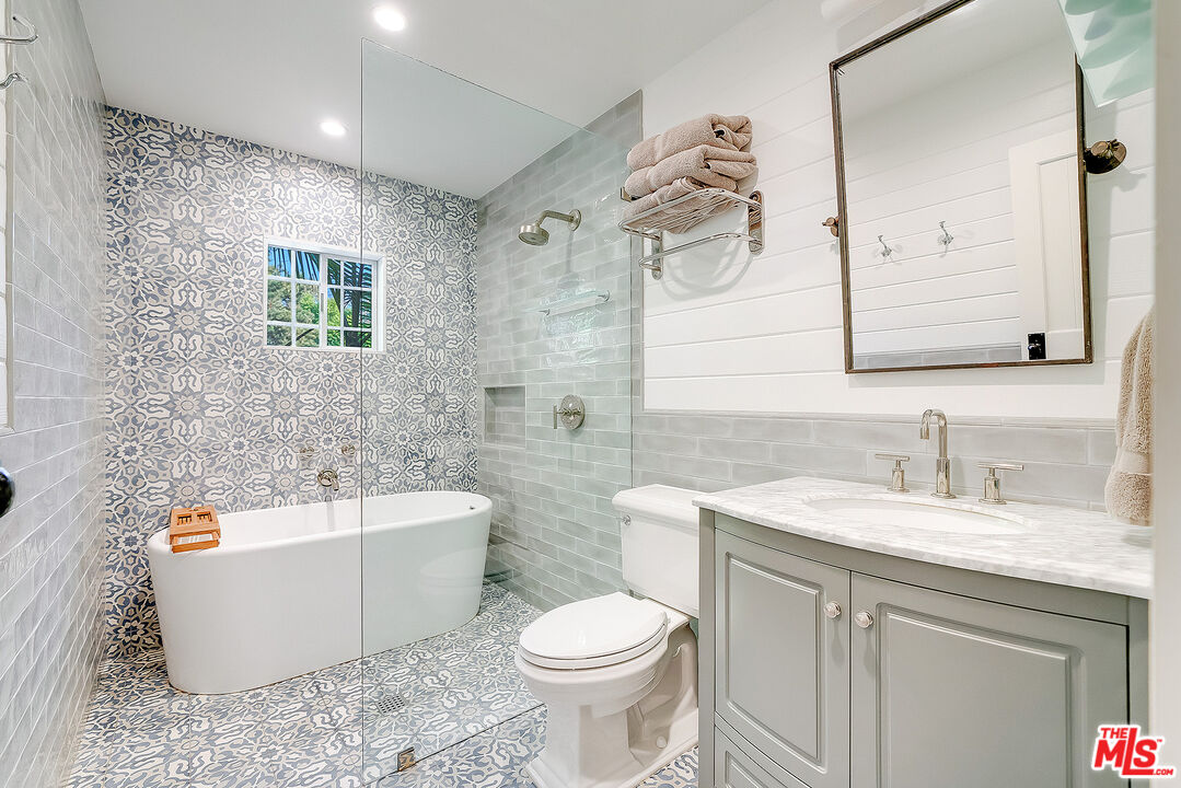 11670 Duque Drive Studio City, CA 91604 - Photo 23 of 48 a bathroom with a sink a toilet and a bathtub