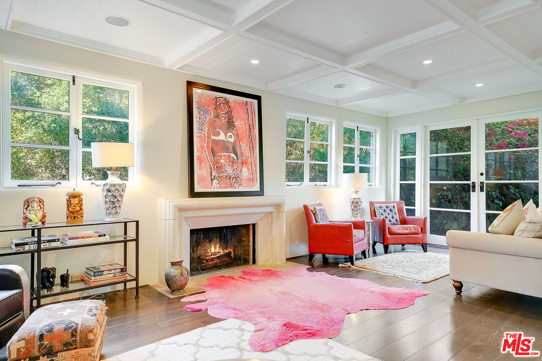 11670 Duque Drive Studio City, CA 91604 - Photo 4 of 48 a living room with furniture or window and a fireplace